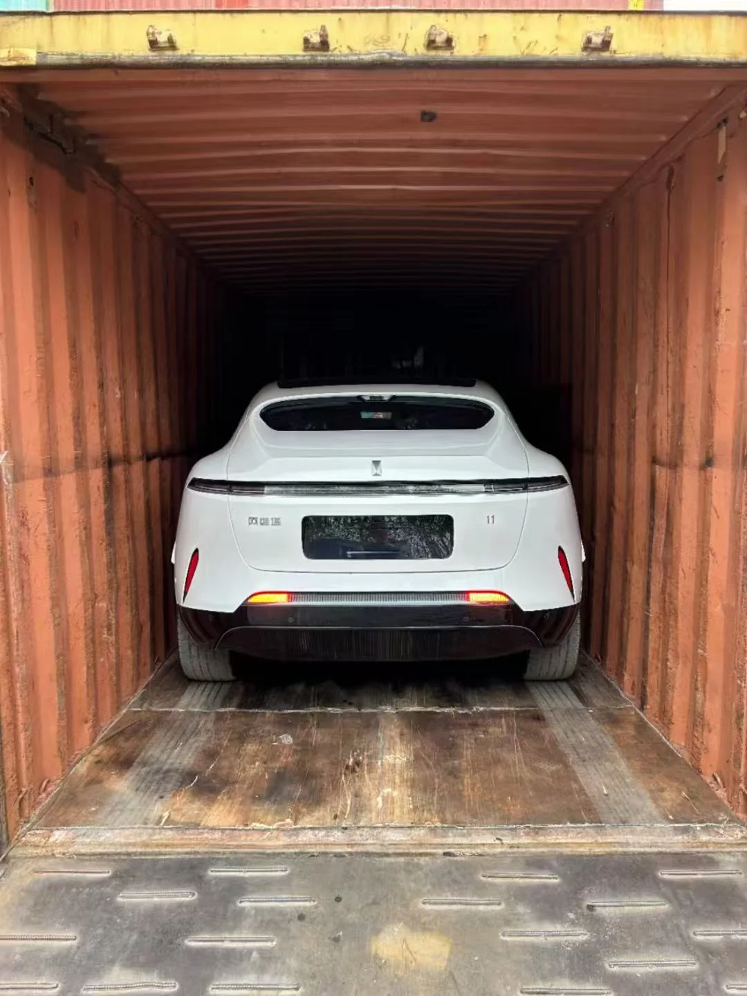 Car loaded inside shipping container